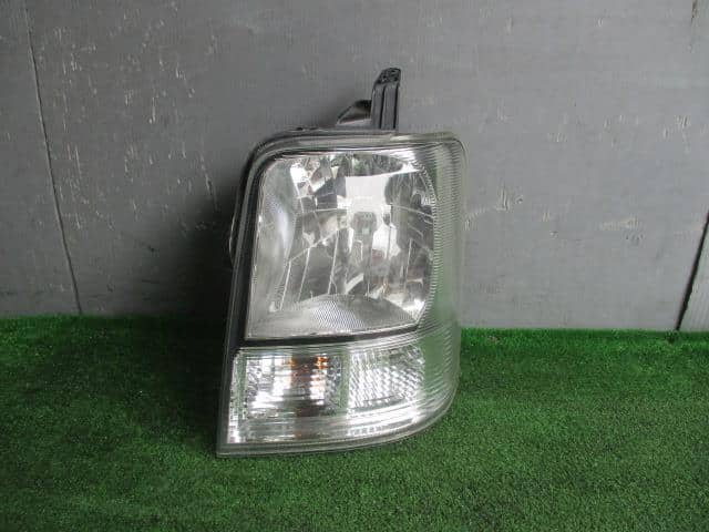 Used]Left Headlight SUZUKI Every 2009 EBD-DA64V - BE FORWARD Auto