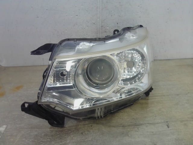 Used]5278 L675S/L685S Mira Cocoa Daihatsu Halogen headlight right
