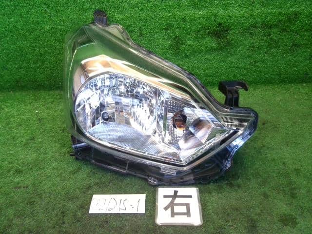 Used]5278 L675S/L685S Mira Cocoa Daihatsu Halogen headlight right