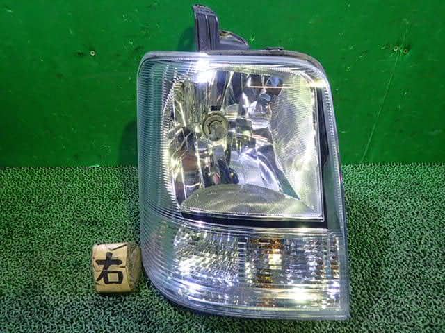 Used]Left Headlight SUZUKI Every EBD-DA64V - BE FORWARD Auto Parts