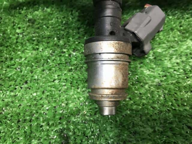 [Used]Injector SUZUKI Jimny 1996 E-JA22W 1571073G00 - BE FORWARD Auto Parts