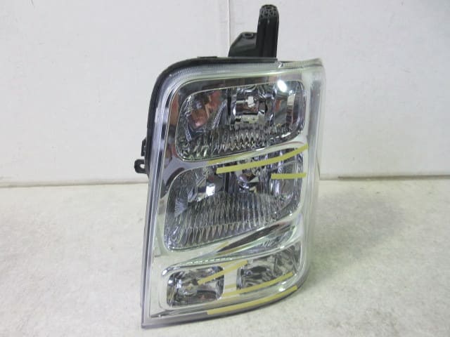 Used]SUZUKI EVERY wagon DA64W Genuine HID Left headlight LE06G6166