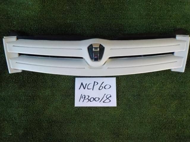 Used]ist NCP60 Front Grill [14890731] - BE FORWARD Auto Parts