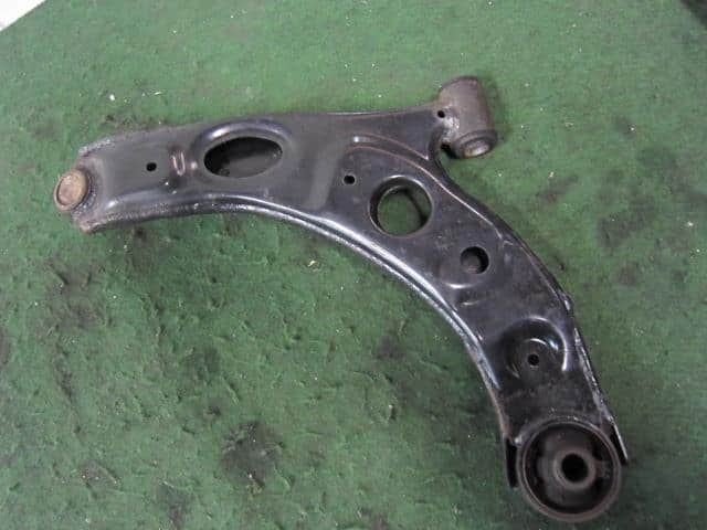 [Used]Passo QNC10 Right Front Lower Arm [15030751] - BE FORWARD Auto Parts