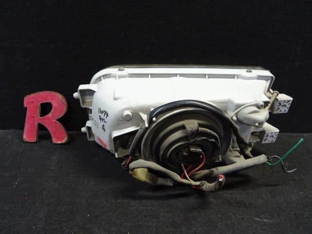 Retainer headlamp suzuki