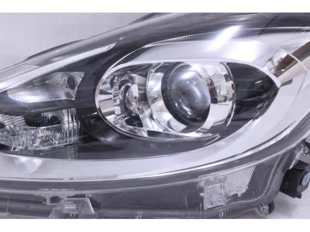 Used]Aqua NHP10 Left Headlight 8117052M10 - BE FORWARD Auto Parts