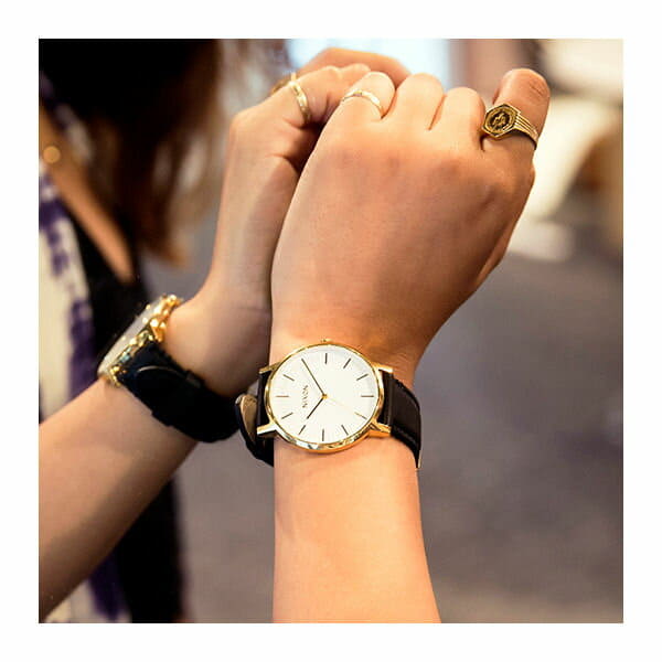 Nixon porter cheap gold black