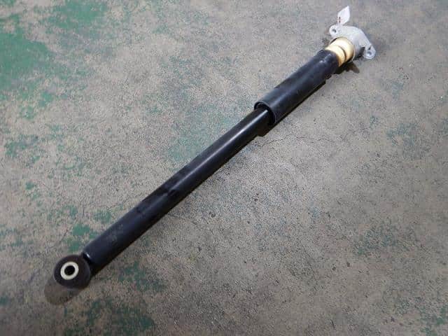 Used]Demio DEJFS Left Rear Shock Absorber D04A2870XE - BE FORWARD Auto Parts