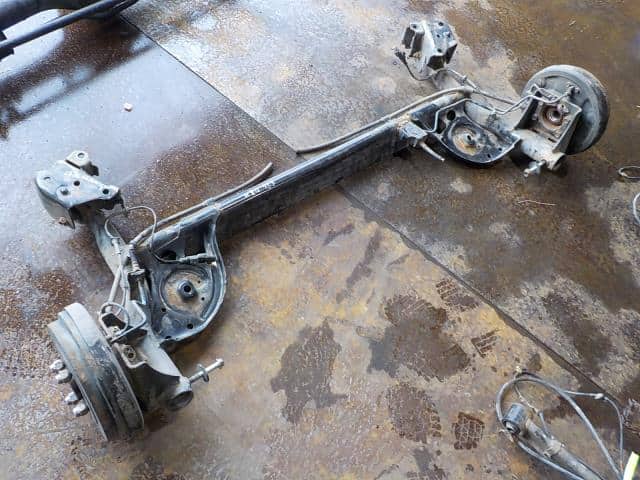 Used]Rear Axle Beam Assembly NISSAN Cube 2009 DBA-NZ12