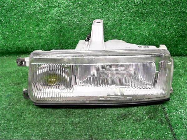 Used]Left Headlight TOYOTA Corolla Levin 1989 E-AE92 811601A410