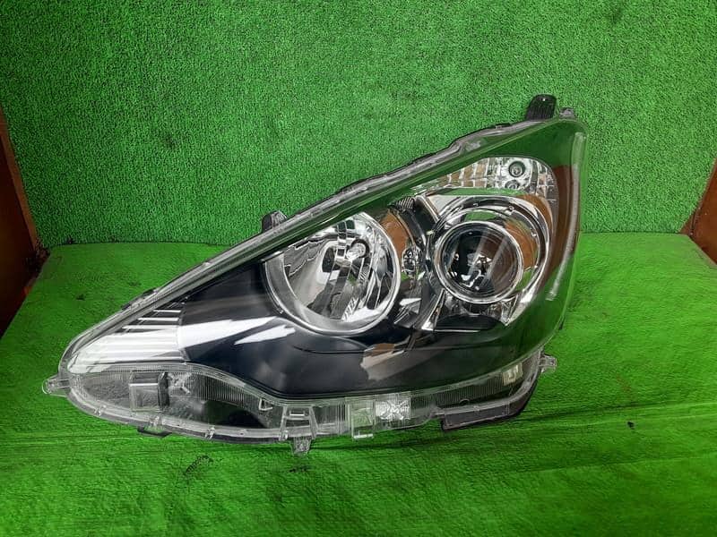 Used]Left Headlight TOYOTA Aqua 2012 DAA-NHP10 8115052E90 - BE