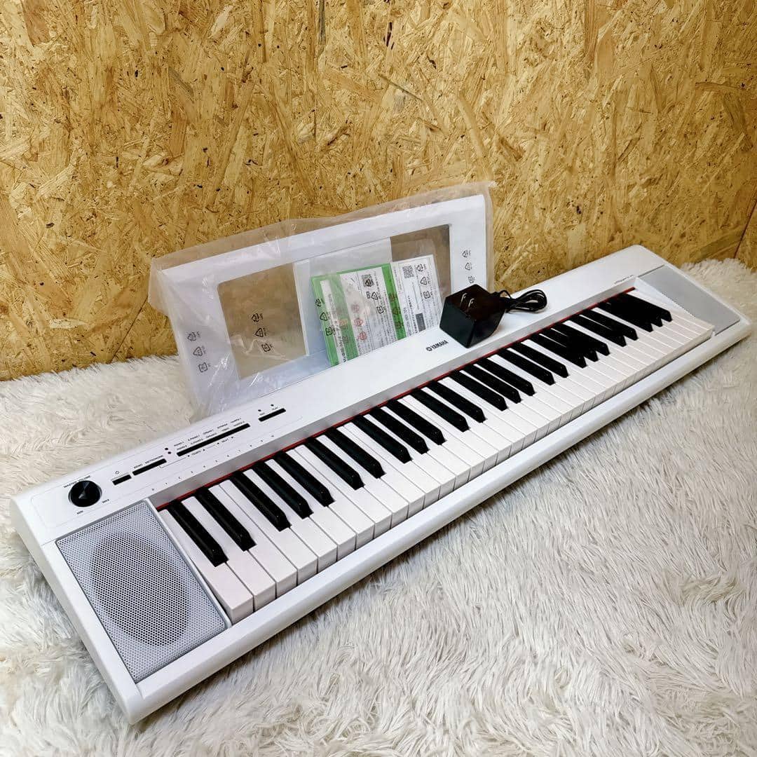 Yamaha Piaggero NP12 Portable Digital Piano, Black at Gear4music