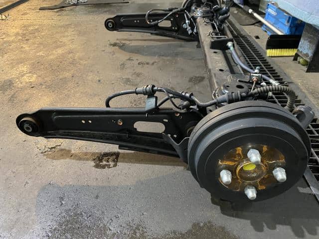 Used]Rear Axle Beam Assembly NISSAN 2023 ZAA-B6AW 555027PA0A - BE