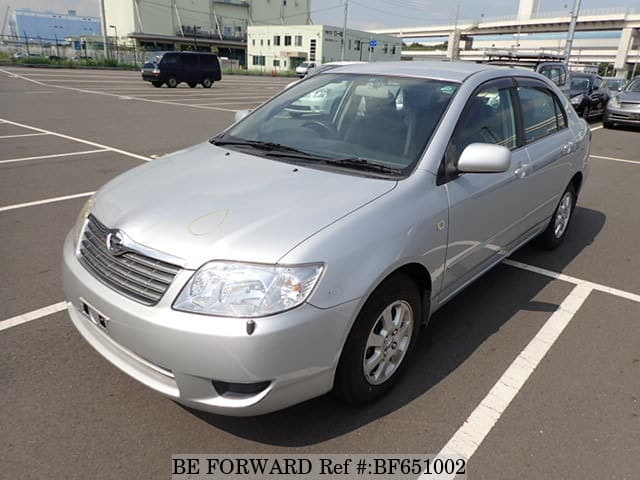 Toyota Corolla Reverse 18 VVTi Executive model year 2005 silver  driving diagonal from the front frontal view country ro Stock Photo   Alamy
