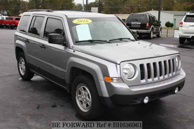 jeep patriot factory subwoofer