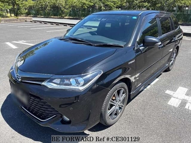 Toyota COROLLA FIELDER HYBRID G WXB — фото 1