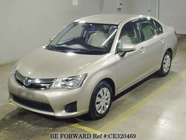 Toyota COROLLA AXIO HYBRID — фото 1