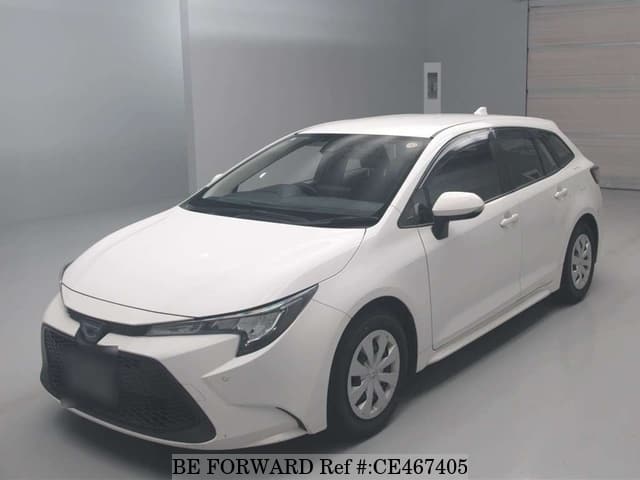 Toyota COROLLA TOURING HYBRID G-X — фото 1