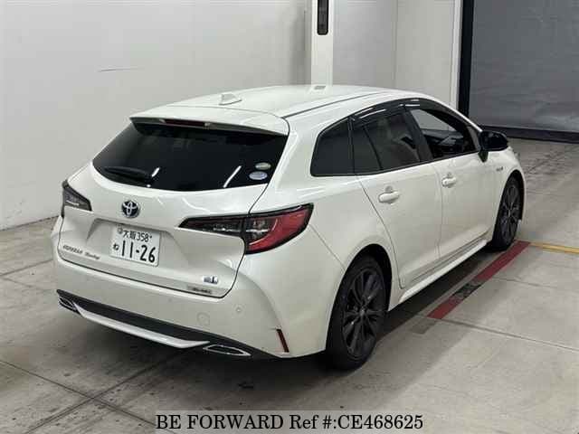 Toyota COROLLA TOURING HYBRID WXB — фото 2