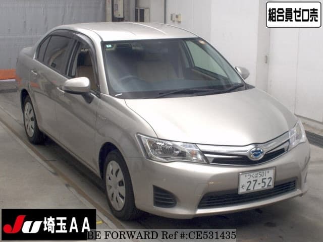 Toyota COROLLA AXIO HYBRID — фото 1