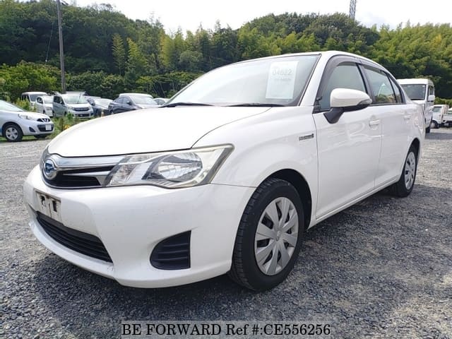 Toyota COROLLA AXIO HYBRID — фото 1