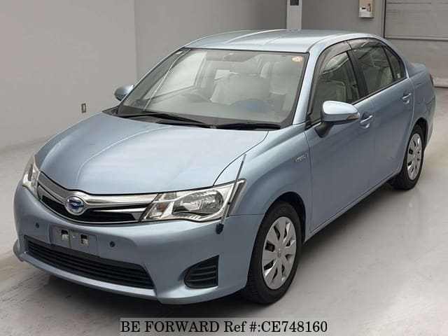 Toyota COROLLA AXIO HYBRID — фото 1