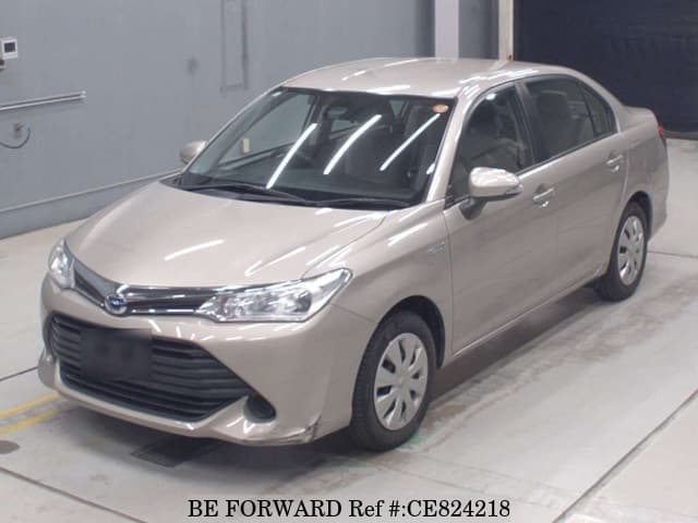 Toyota COROLLA AXIO HYBRID — фото 1