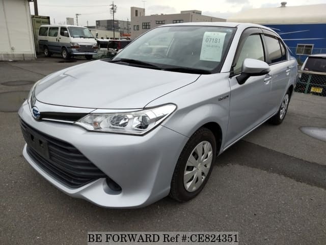 Toyota COROLLA AXIO HYBRID — фото 1